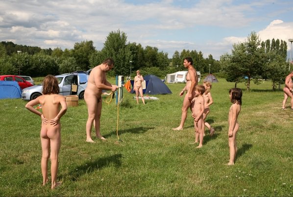 Naturista outdoors have a rest in the tent city Naturista outdoors have a rest in the tent city