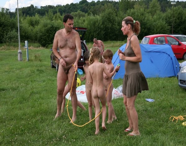 Naturista outdoors have a rest in the tent city Naturista outdoors have a rest in the tent city