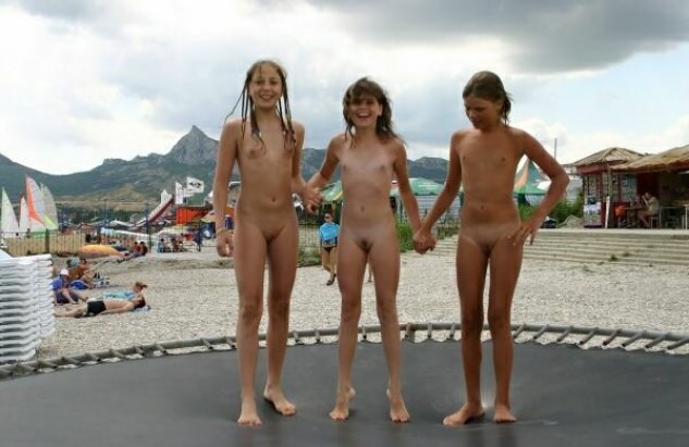 Family nudism - little girls nudists on a trampoline Family nudism - little girls nudists on a trampoline
