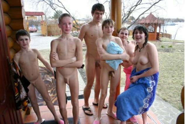 Nudists a family in a sauna Nudists a family in a sauna