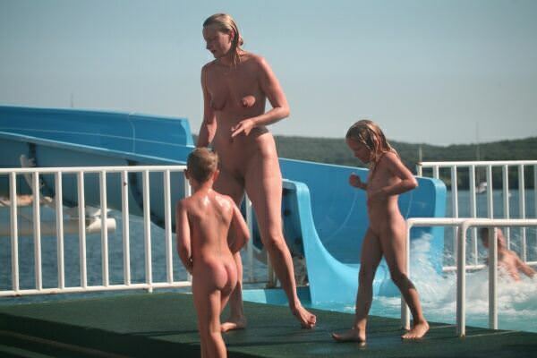Photos about a family nudism in an aquapark Photos about a family nudism in an aquapark